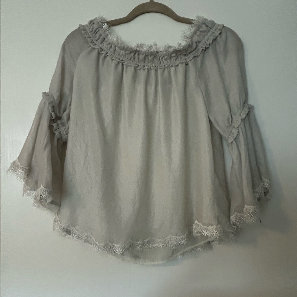 Selling a willow and clay blouse off the shoulder